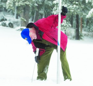 Frank Gehrke of the Department of Water Resources checks the snowpack depth near Echo Summit. The latest survey on December 30, 2015 showed the snowpack was 136% of normal for this time of year. Photo: California Department of Water Resources