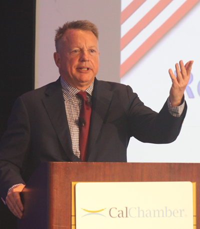 Robert Green of Penn, Schoen & Berland Associates presents highlights of the CalChamber annual survey on California voter attitudes at the opening session of the CalChamber Public Affairs Conference.